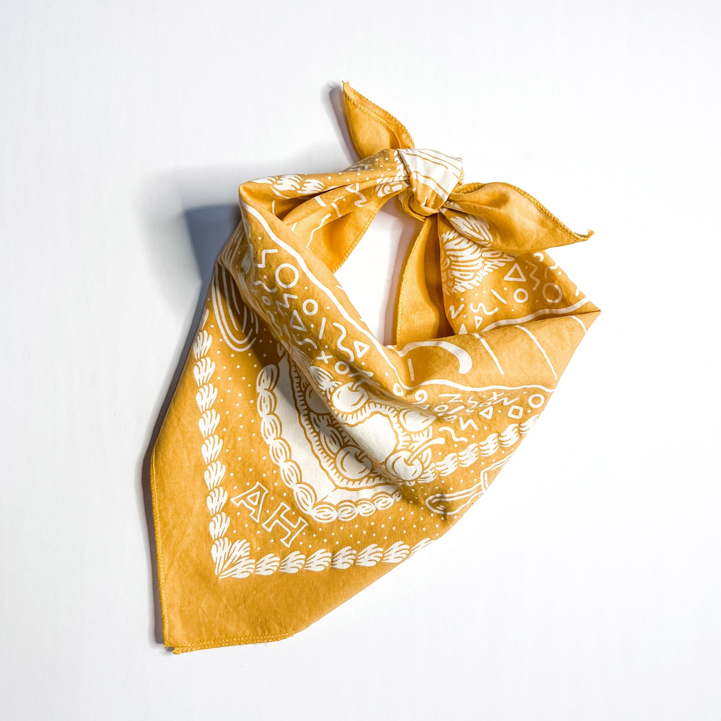 tied gold bandana with natural ink